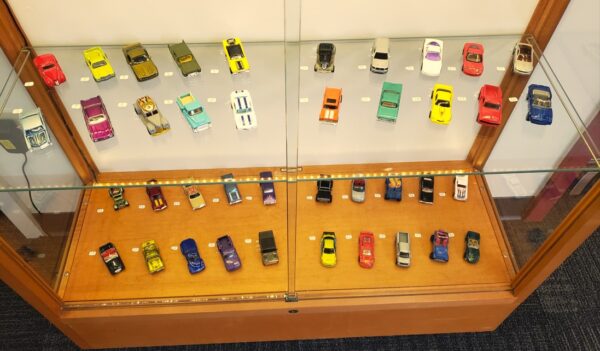 close-up look at toy cars and trucks in display case